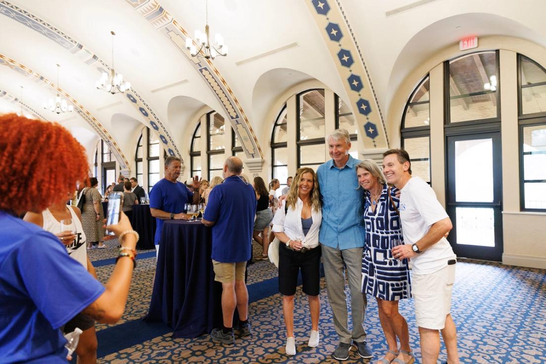 President Grant Cornwell and his wife, Peg, posing with parents