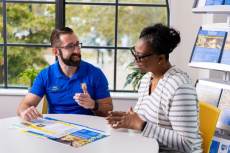 A Rollins graduate admission counselor meets one on one with a prospective student.