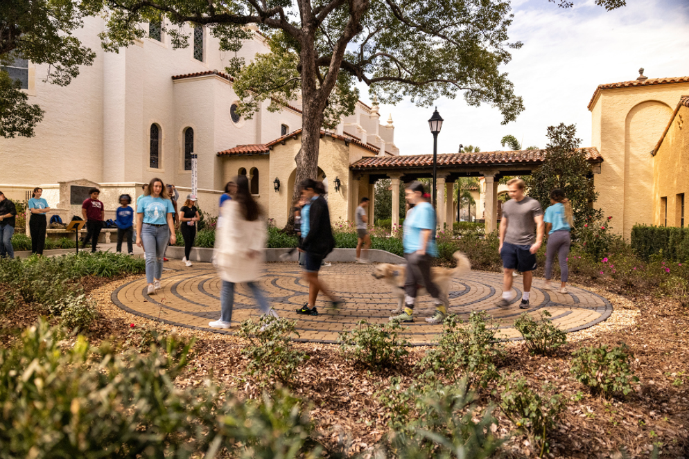 Rollins students participating in a labyrinth walk