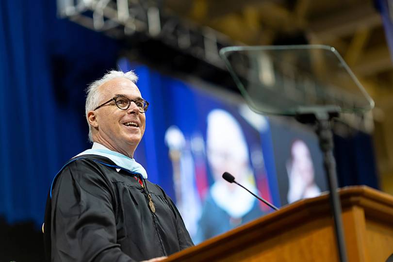 Gary McKechnie ’26MLS giving his commencement address
