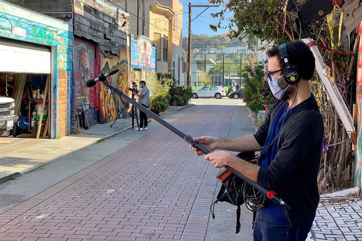 Camilo Garzón ’15 recording location sound for the San Francisco Museum of Modern Art’s documentary “Las Muralistas: Our Walls, Our Stories.”