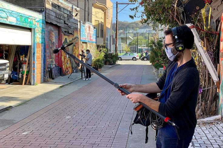 Camilo Garzón ’15 recording location sound for the San Francisco Museum of Modern Art’s documentary “Las Muralistas: Our Walls, Our Stories.” 