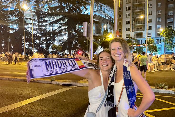 Bridget Collis ’23 ’24MBA (right) and Ava Gordon ’25 take in a soccer match between Real Madrid and Real Betis at the Estadio Santiago Bernabeu.