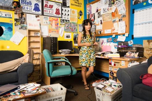 A Rollins student stands in the office at WPRK.