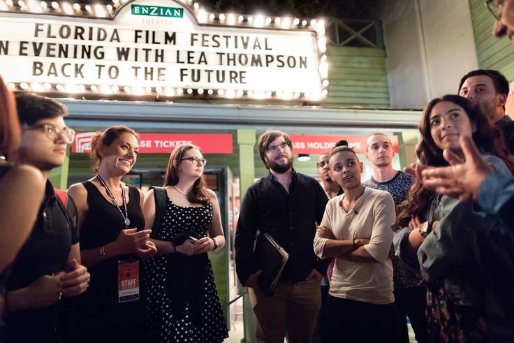 A group of students attends the Florida Film Festival at the Enzian Theater.