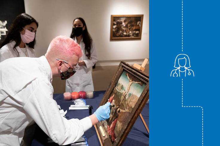 Isaac Gorres ’21 applies a biological solution to the pigments of an Old Master painting.