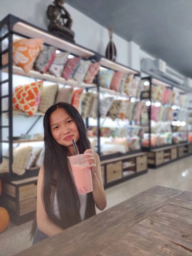A Rollins College student drinks boba will near campus.