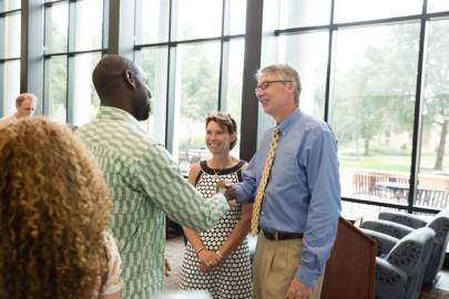 Grant and Peg Cornwell meet Rollins community members during a welcome event