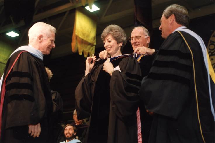 Rita Bornstein pictured with former presidents Hugh McKean, Thaddeus Seymour, and Jack Critchfield.on her inauguration day as the first woman president of Rollins.