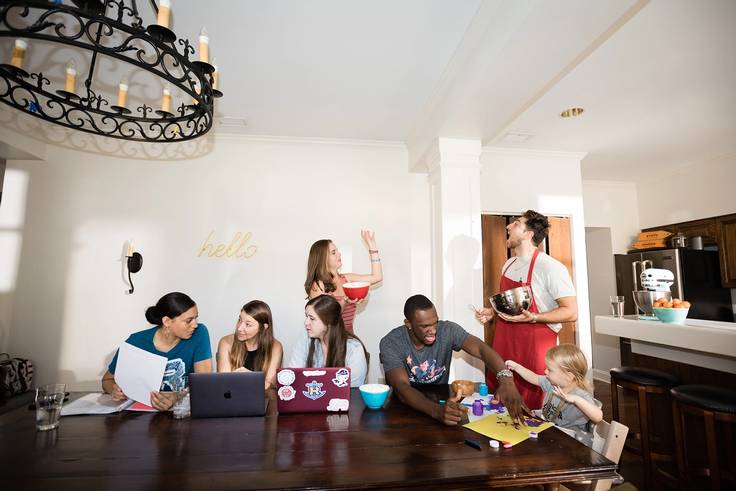 Students and professor share space in one of Rollins’ Living Learning Communities.