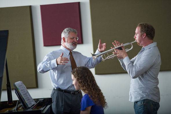 John Sinclair working with a Rollins trumpet and piano students