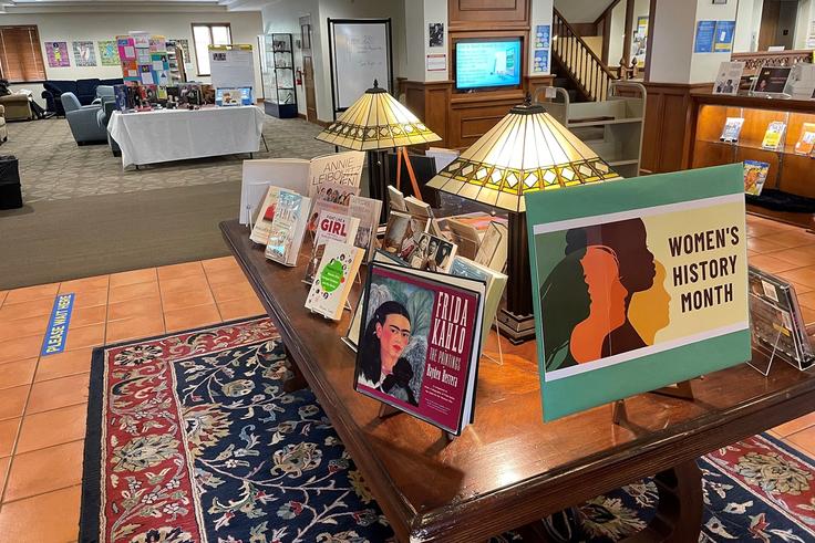 Display table highlighting Women's History Month at Olin Library.