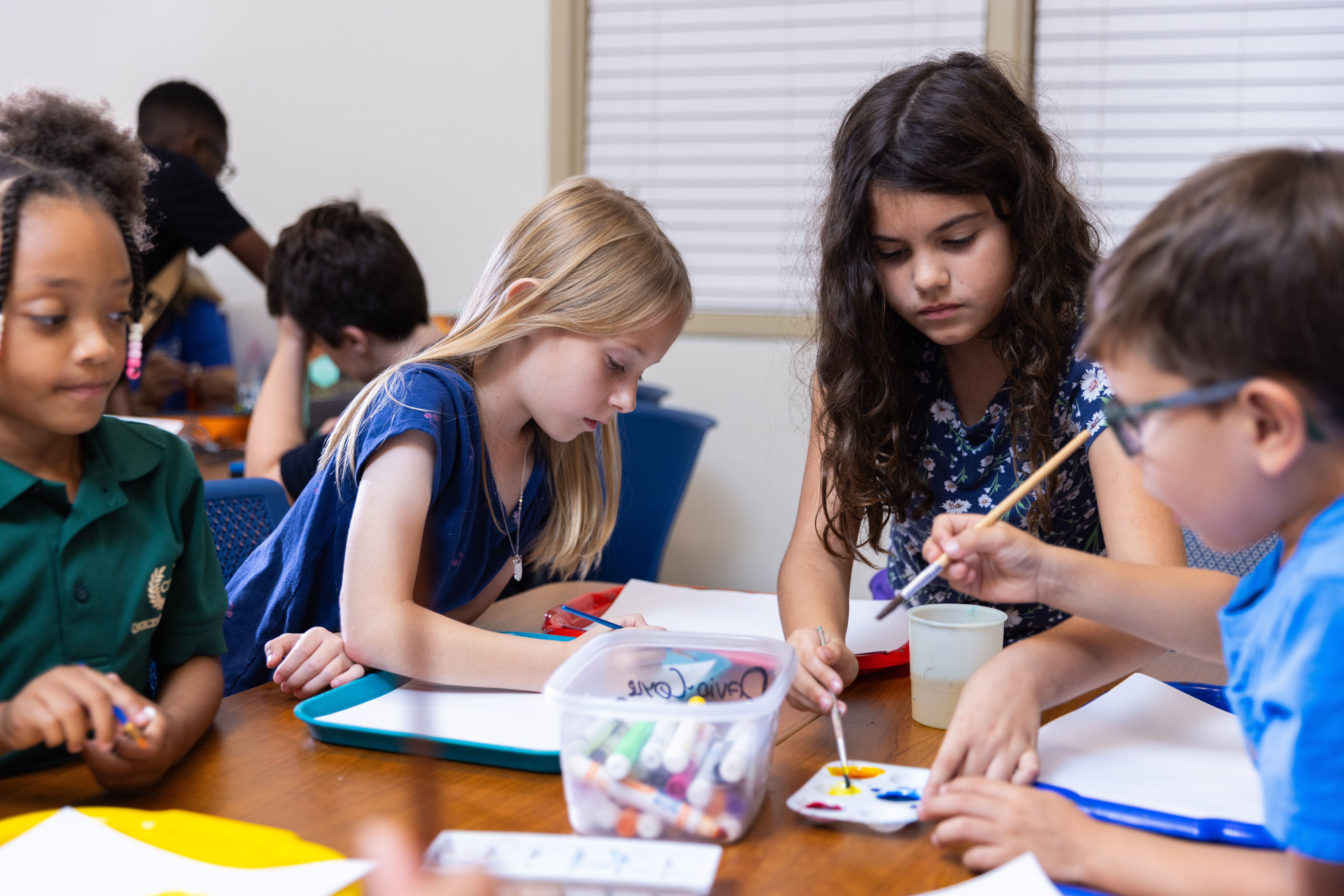Children complete an art project during Evening Educare.