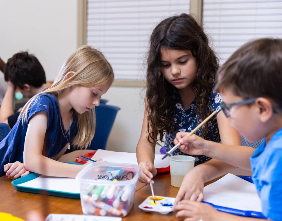 Children complete an art project during Evening Educare.