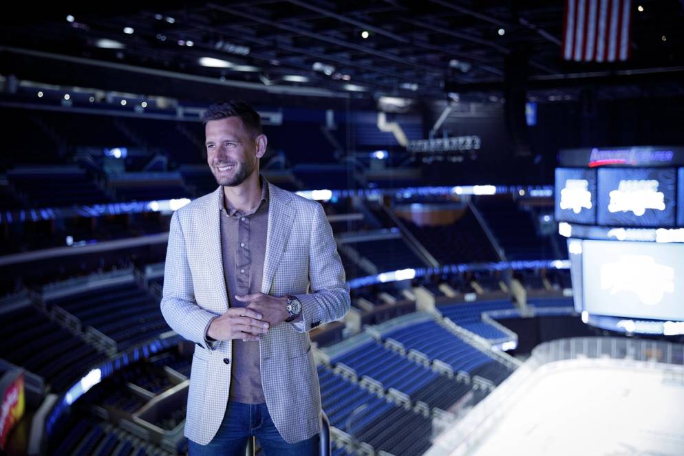 Ryan DeVos ’13 at the Amway Center in downtown Orlando.