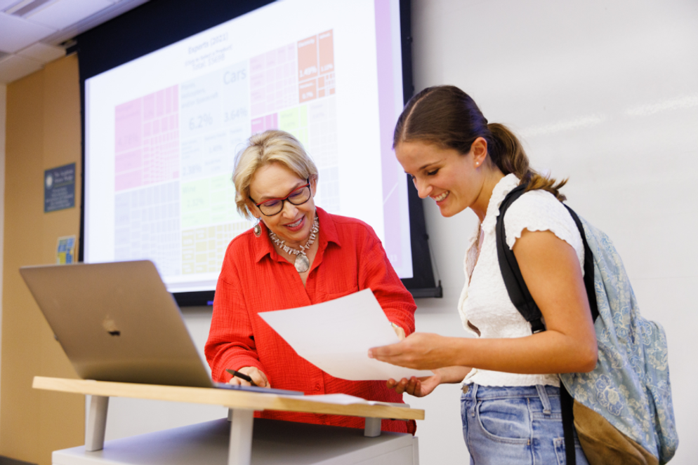 Juliette Bennie ’23 with one of her mentors, economics professor Anca Voicu.