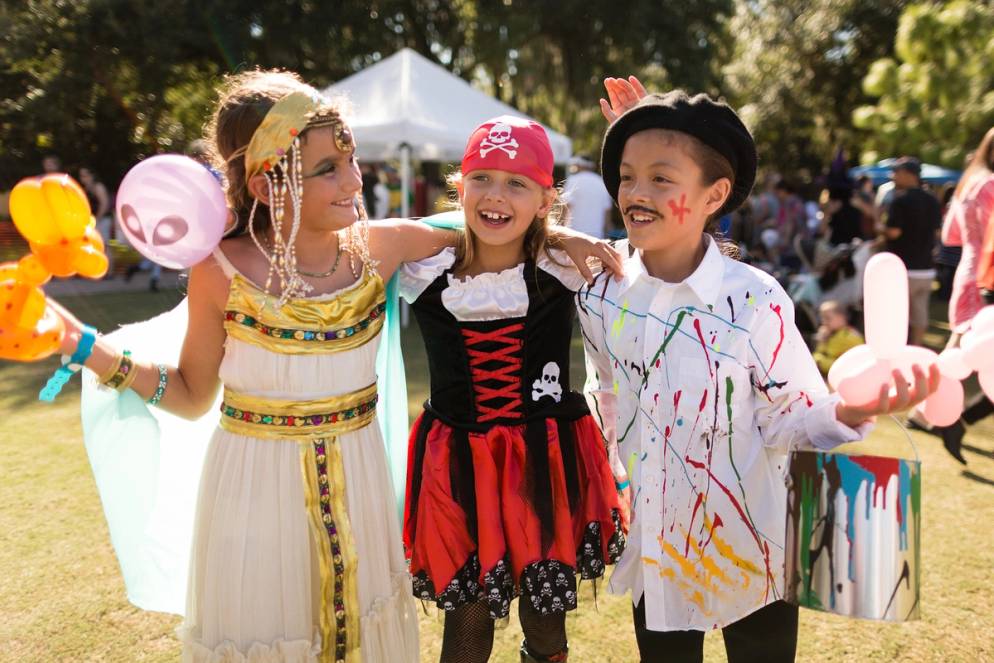 Kids dressed up for Halloween Howl on campus.