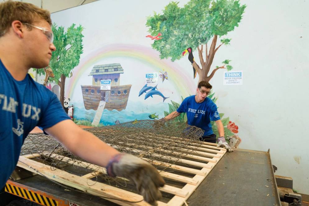 Students breaking down mattresses on SPARC Day, the College's annual day of service.