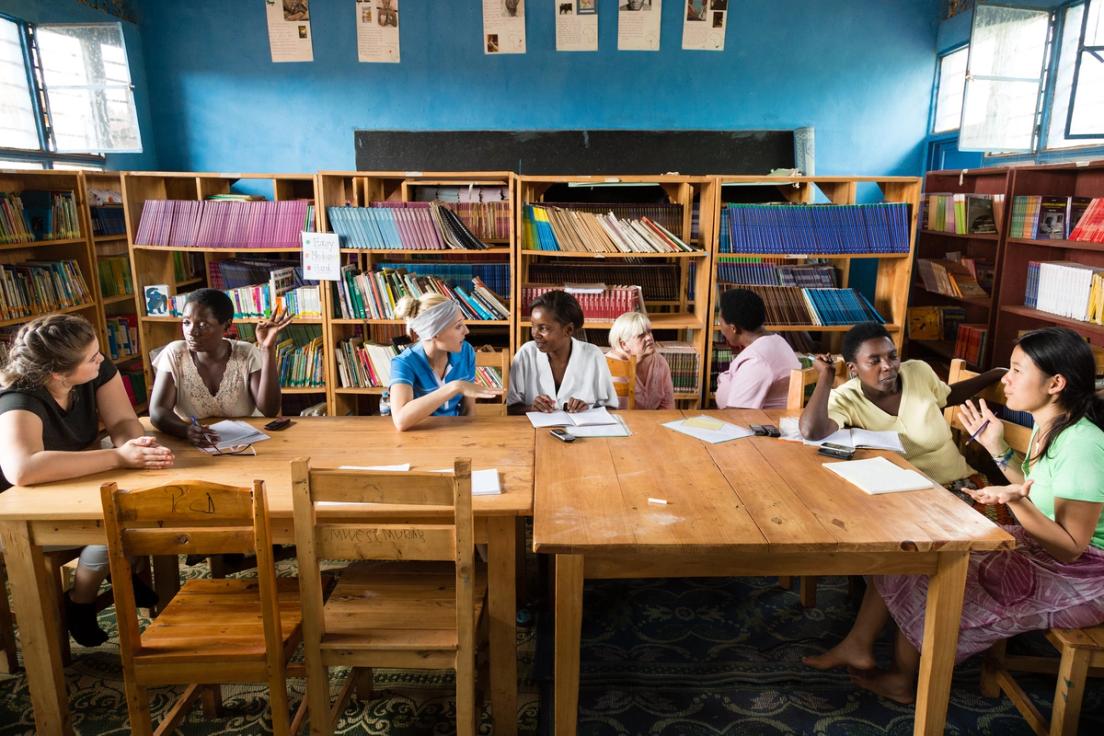 Rollins students and Professor of Communication Studies Sue Easton work with P1 and P2 teachers to practice their English skills while getting to know each other.