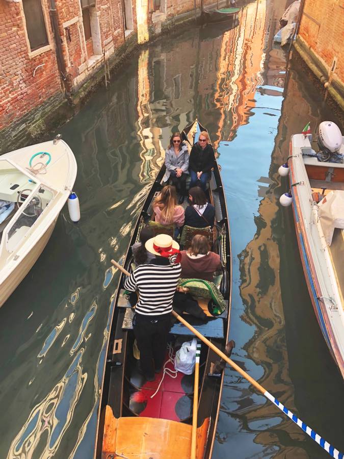 Rollins students take a gondola ride through the Venetian canals.