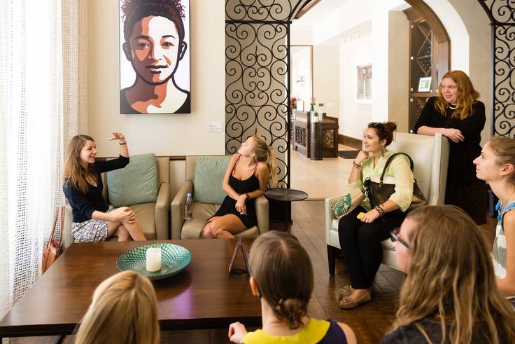 MacKenzie Moon Ryan, Ph.D and Amy Galpin, Ph.D take a class of Rollins College students to tour the Alfond art collection at Alfond Inn in Winter Park, Florida.