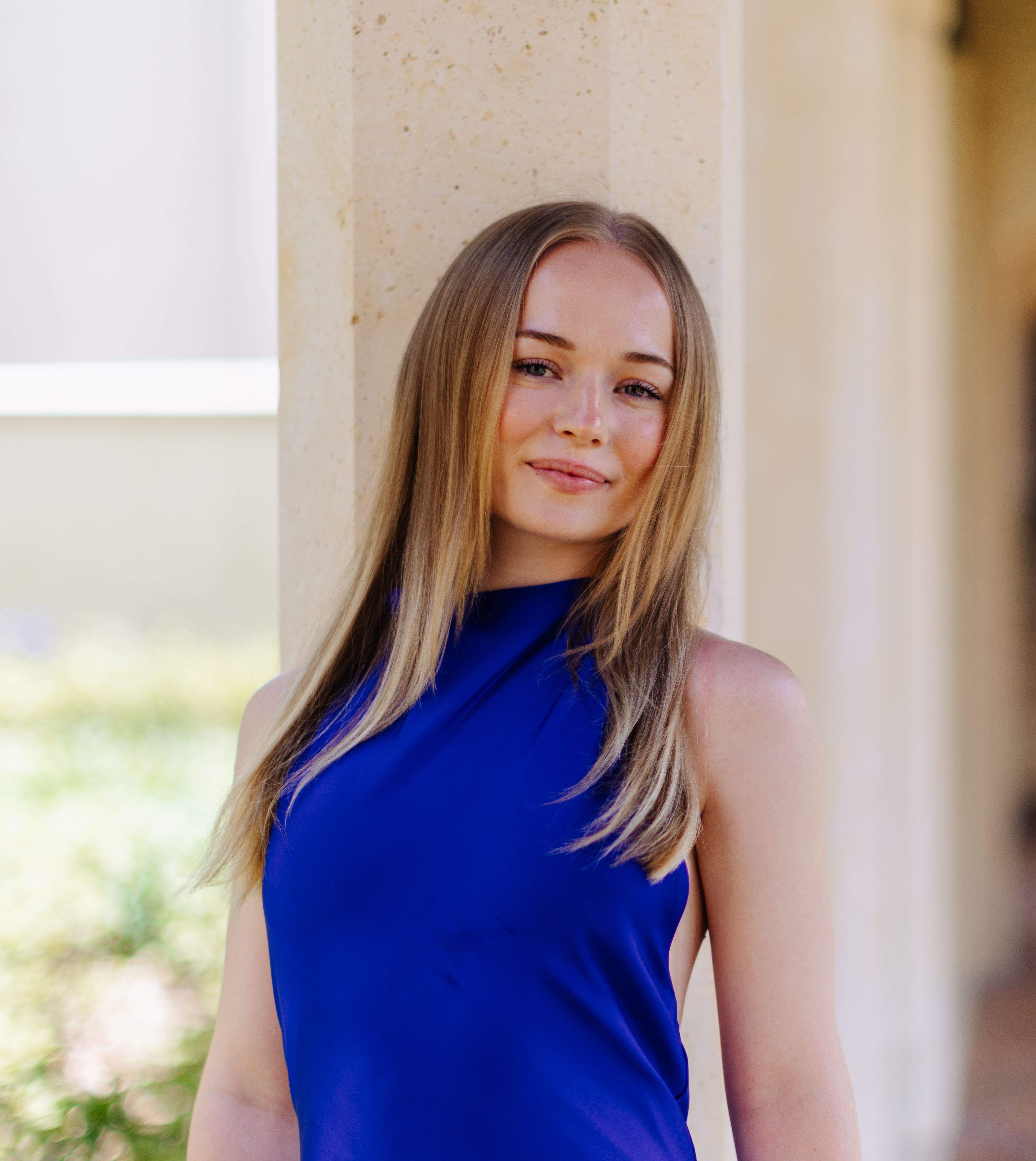 Adara Evans poses on campus at Rollins College