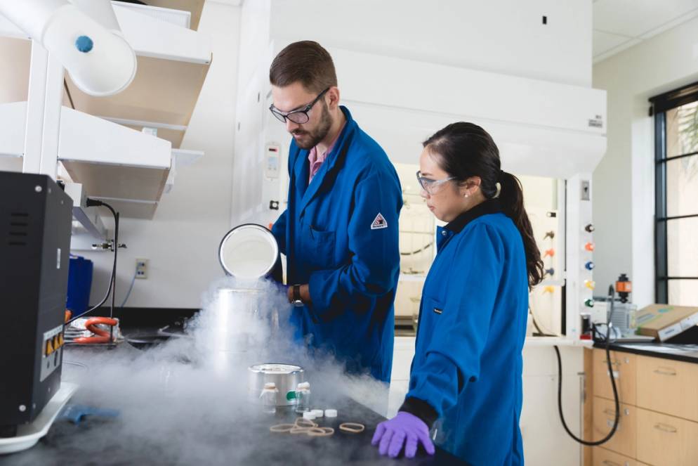 Ellane Park and Julian Grundler working with liquid nitrogen.