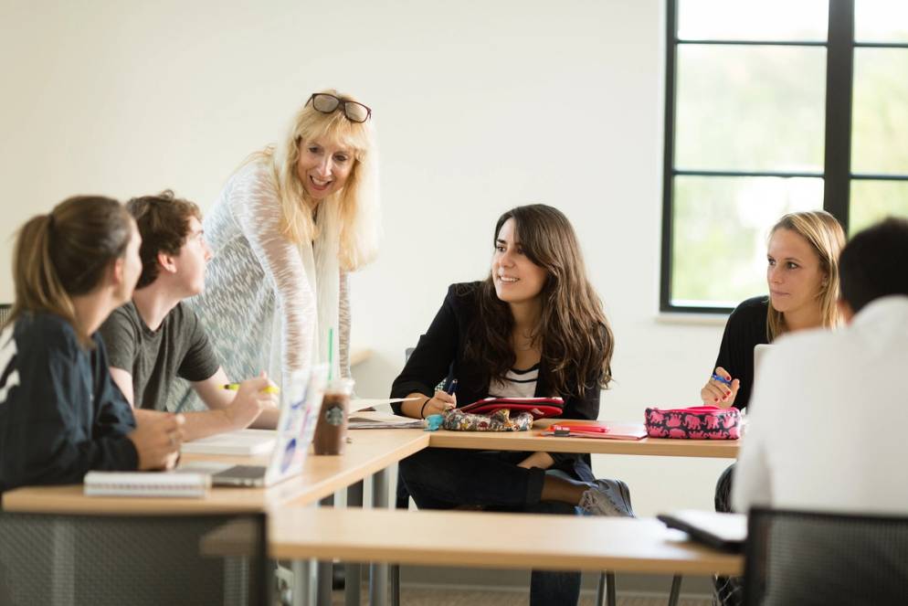 Nancy Niles, chair of the Department of Health Professions, pictured engaged students in class discussion.