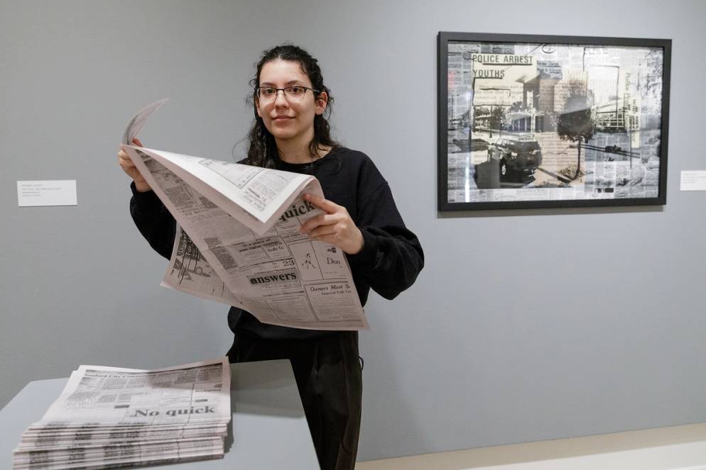 Andrea Czafit ’21 pictured with her original artwork for her senior exhibition.