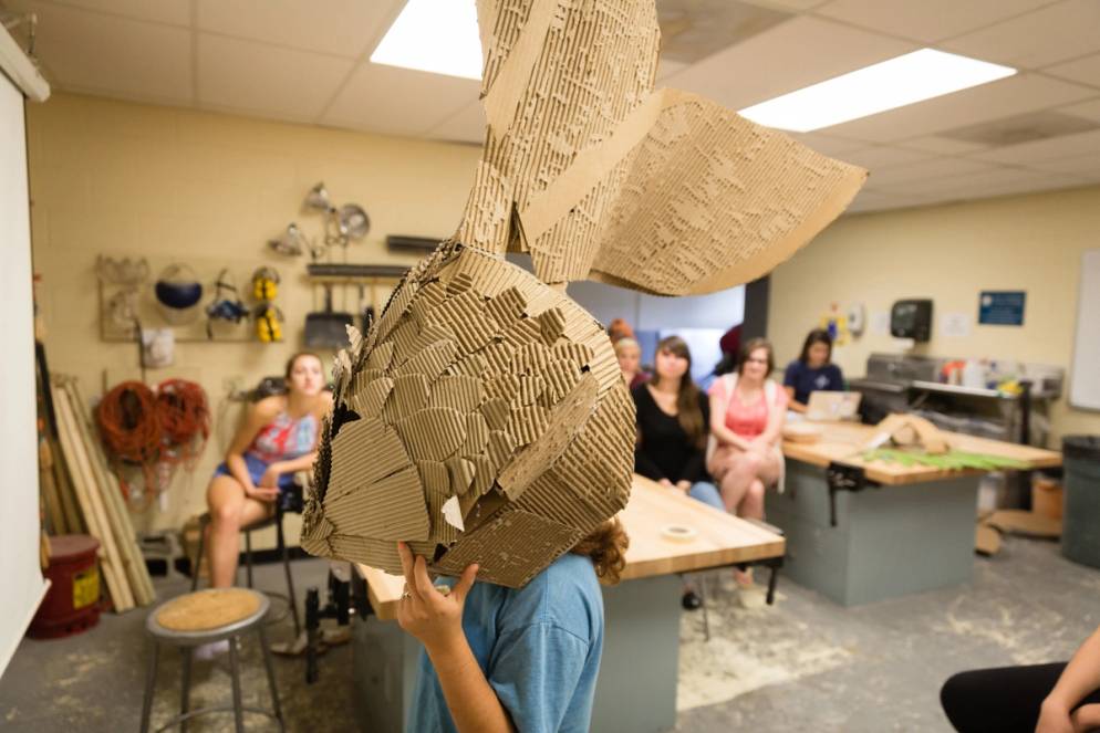 A student wearing a fish hat.