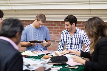 Students work together on a project for a local social enterprise.