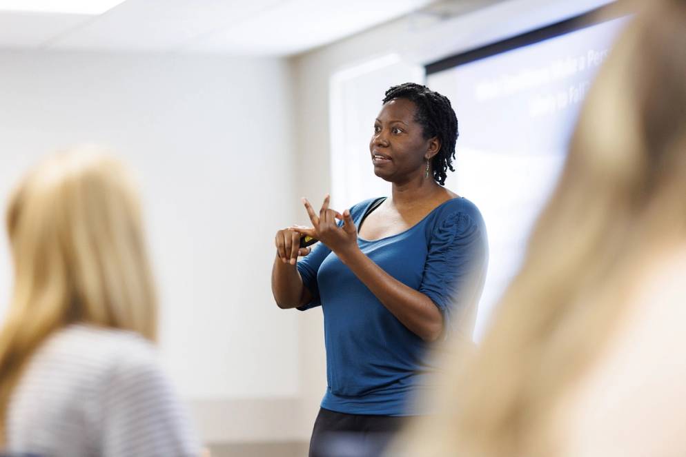 A anthropology professor leads a classroom discussion.