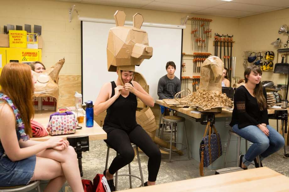 A student wearing a bear hat.