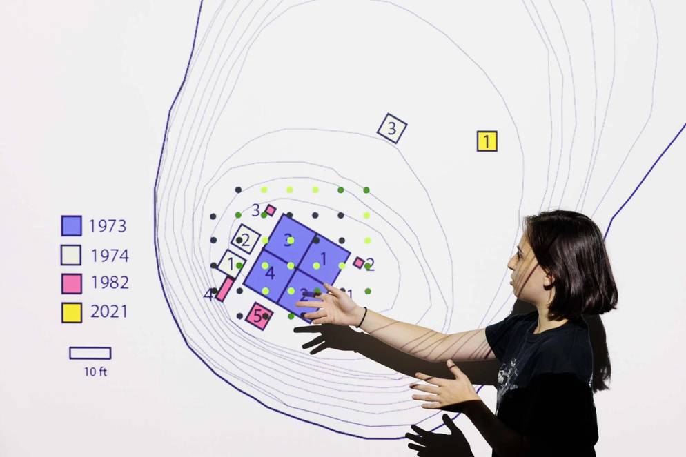 Zoe Milburn ’22 shows the maps she and Ellie Minette ’22 use to plot out where to dig in relation to prior expeditions.