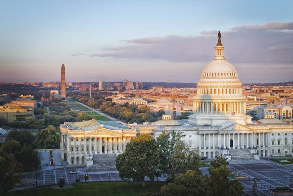 The capitol building and Lincoln Memorial at dawn.