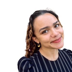 Cristina Toppin '21 in a striped top poses against white background. 