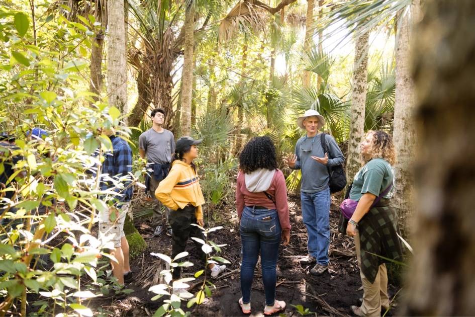 Environmental studies professor Barry Allen leads students on a field study at Canaveral National Seashore.