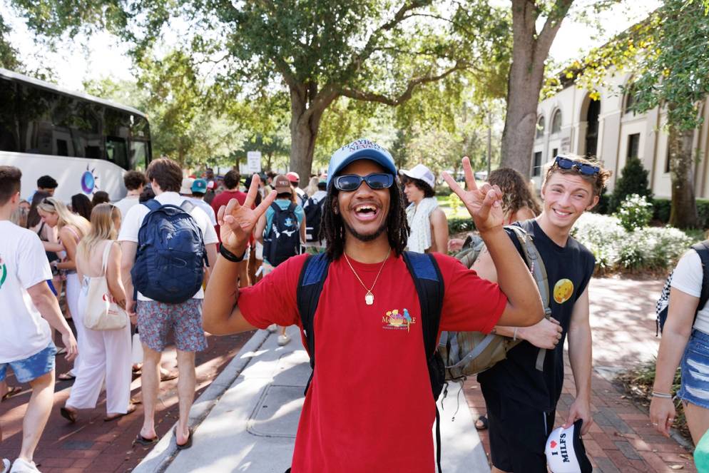 A student gets ready to hop on the bus to the beach on Fox Day.