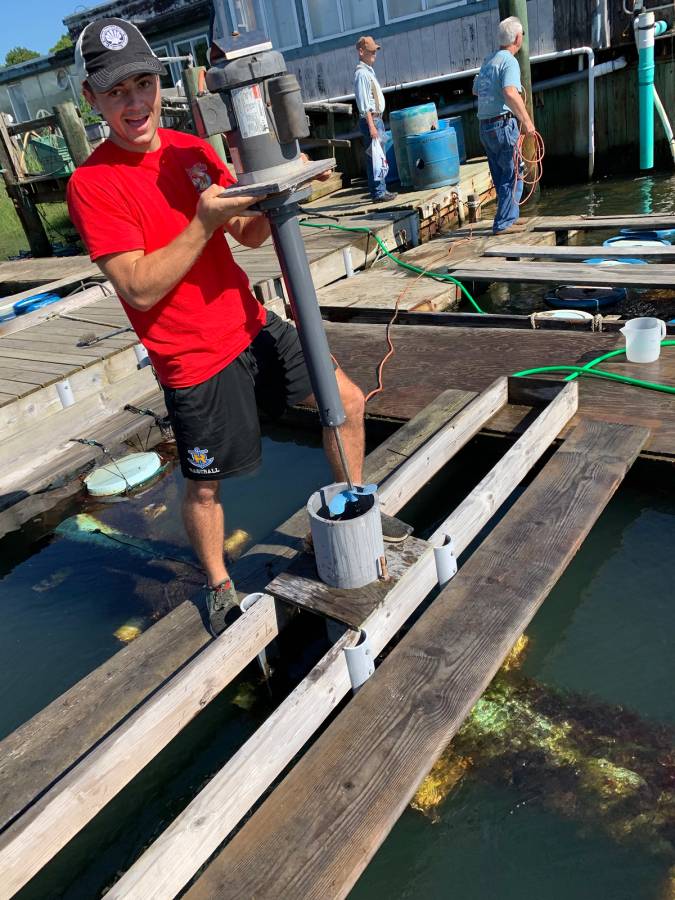 Colin Kelly ’21 operating equipment during his marine biology internship in upstate New York.