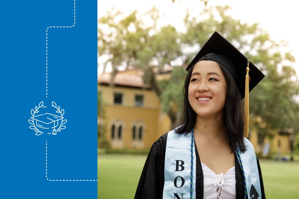 Renee Sang ’21 in her graduation regalia on the Rollins campus.