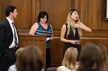 Brian Cohan ’16, Kendra Davies ’16, and Shiying Gu ’16 present to local and state officials.