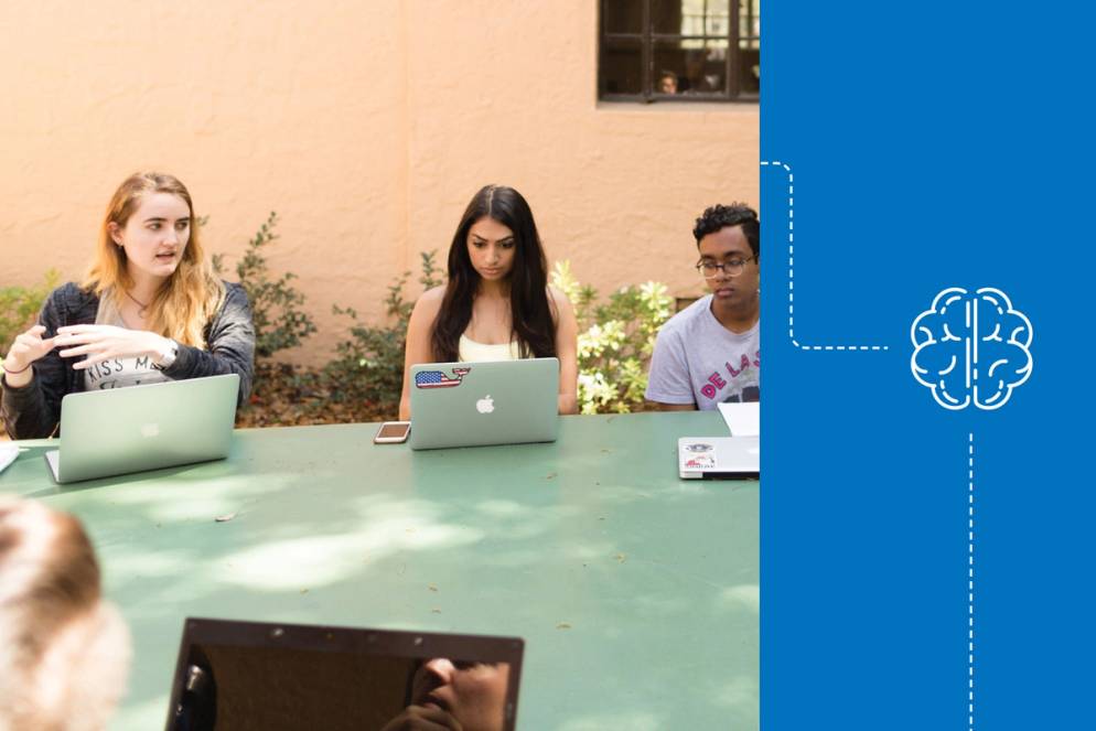 Shannon Sullivan ’20 engages in discussion with fellow classmates in Rollins’ outdoor classroom.