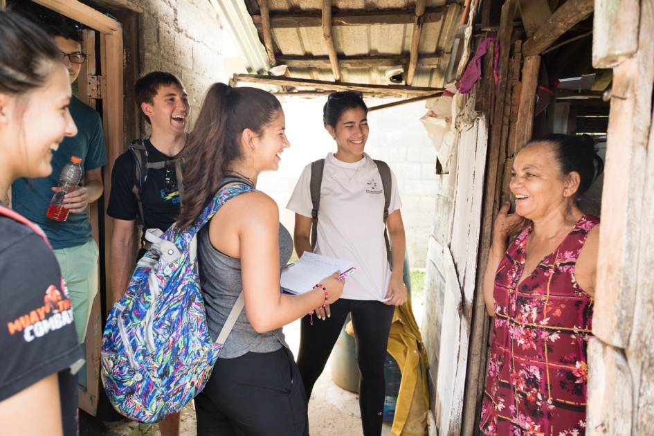 A group of Rollins students conduct a survey in rural Dominican Republic.