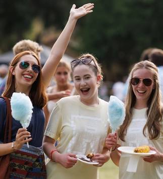 Three students at the Fox Day picnic