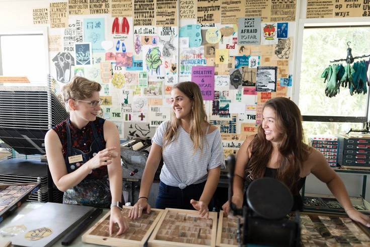 Rollins students with printing blocks.