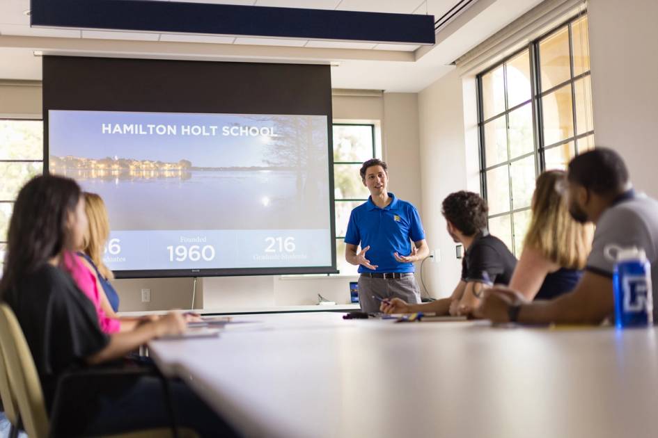 An admission counselor leads an information session at Rollins College.