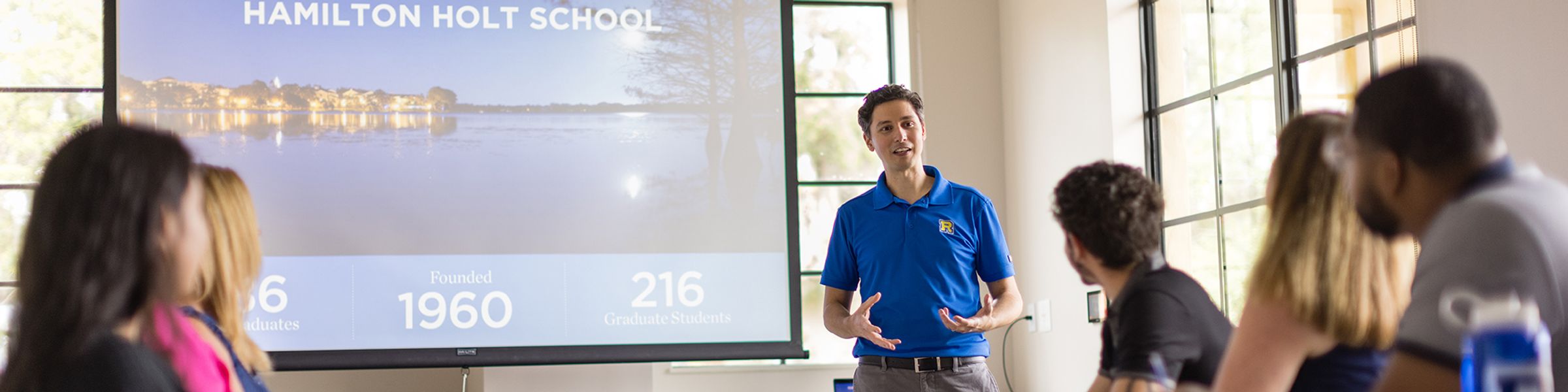 An admission counselor leads an information session at Rollins College.