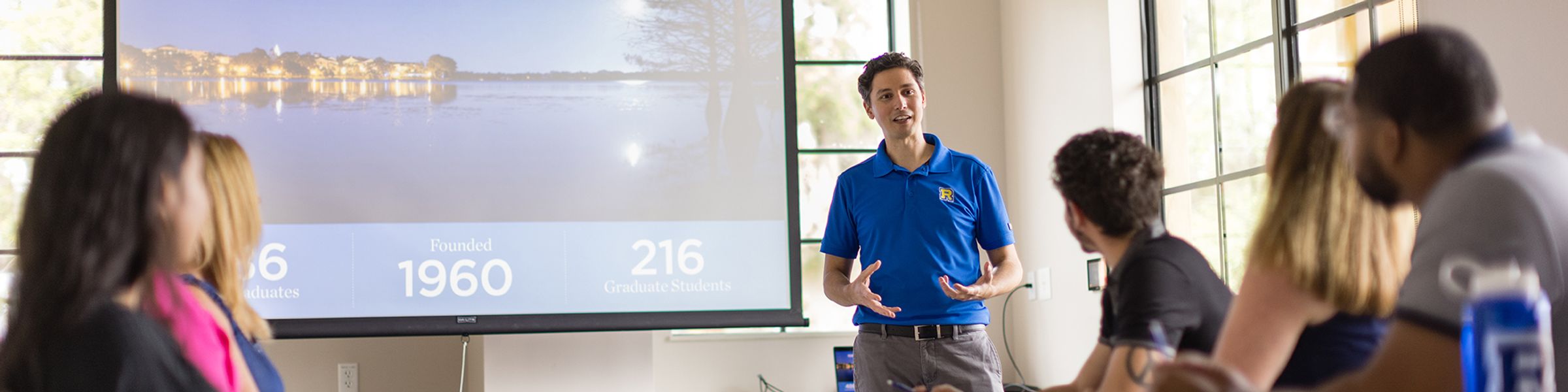 An admission counselor leads an information session at Rollins College.