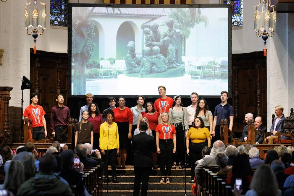 Rollins Singers perform at the Mister Rogers sculpture unveiling.