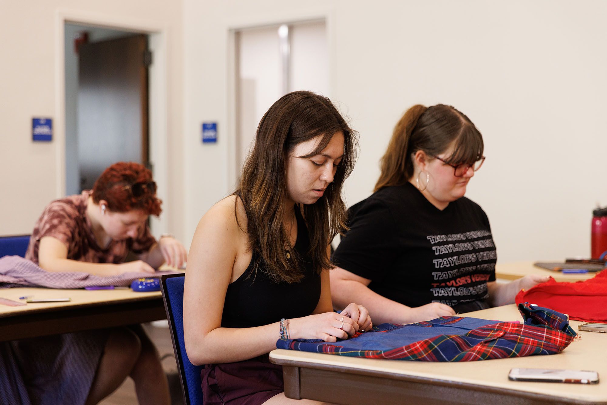 Students making costumes in the Costume Studio & Design Technology Lab in Tiedtke Theatre & Dance Centre.